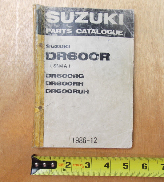 USED SUZUKI 1986-12  PARTS CATALOGUE BOOK DR600R/RG/RH/RUH  900B-30059-010 - MotoRaider