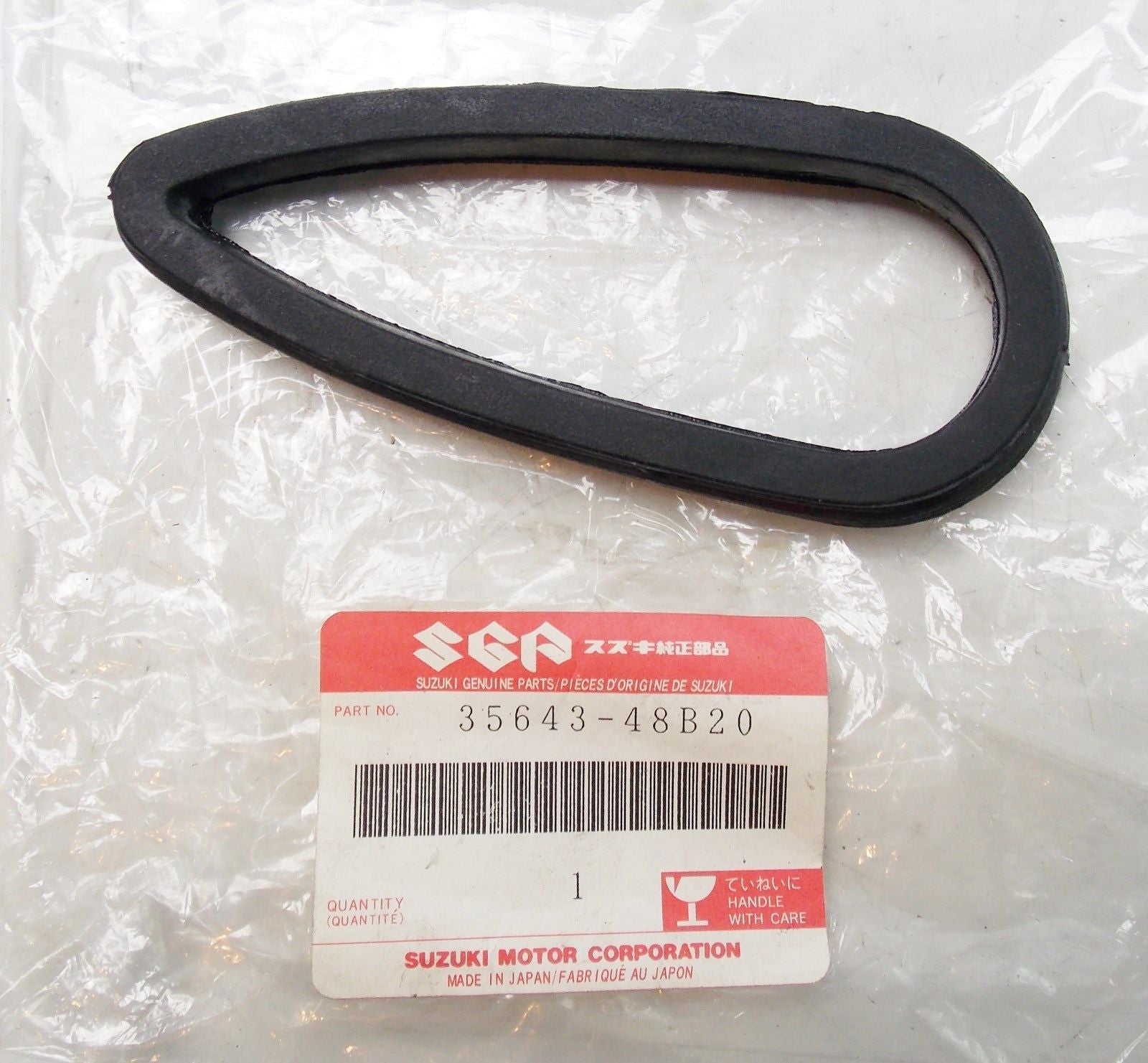 NOS SUZUKI 1988-1993 TURN SIGNAL LAMP GASKET GSX1100   35643-48B20 - MotoRaider