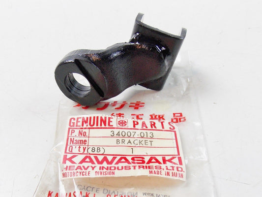 NOS KAWASAKI  1976-1979 FOOT REST BRACKET KE175 KD175  34007-013 - MotoRaider