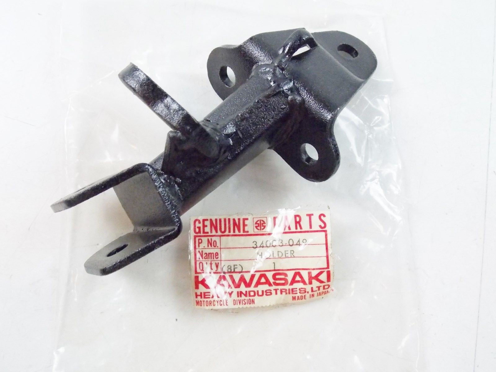 NOS KAWASAKI  1972-1986 LEFT FOOTREST BAR HOLDER  G5 KE100   34003-049 - MotoRaider