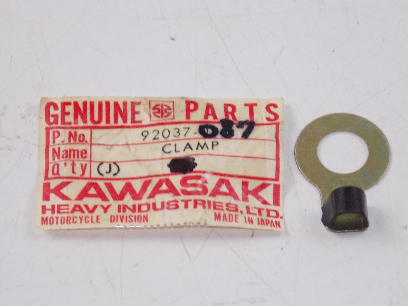 NOS KAWASAKI 1969-1981 CLAMP RR SIGNAL LAMP (2) G3/4 F6/7 KE100 KV100 92037-087 - MotoRaider