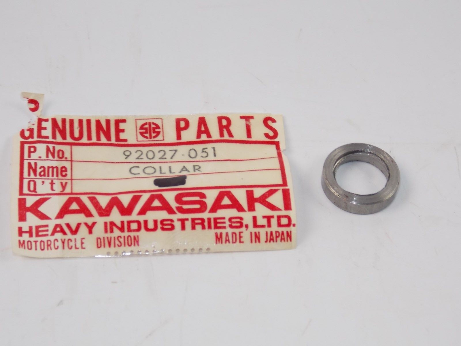 NOS KAWASAKI 1972 LEFT HAND COLLAR H1  92027-051 - MotoRaider