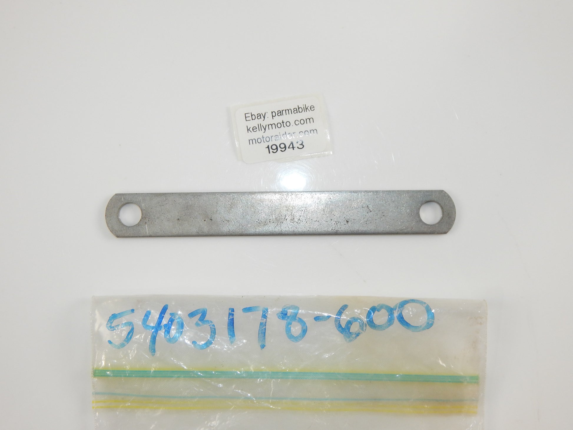 OEM KTM FRONT BRAKE ANCHOR STAY OVERALL LENGTH 6 1/16" x WIDTH 3/4" 5403178600 - MotoRaider