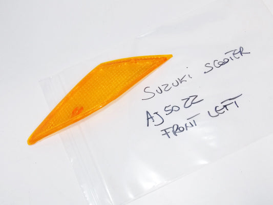 NEW SUZUKI SCOOTER 1995 AJ50 ZZ FRONT LH FLASHER TURN SIGNAL LENS 35632-25E20 - MotoRaider