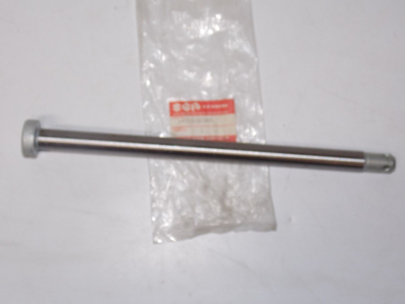 OEM NOS SUZUKI 1983 1985 REAR AXLE WHEEL GS750E ES  64711-31300 - MotoRaider
