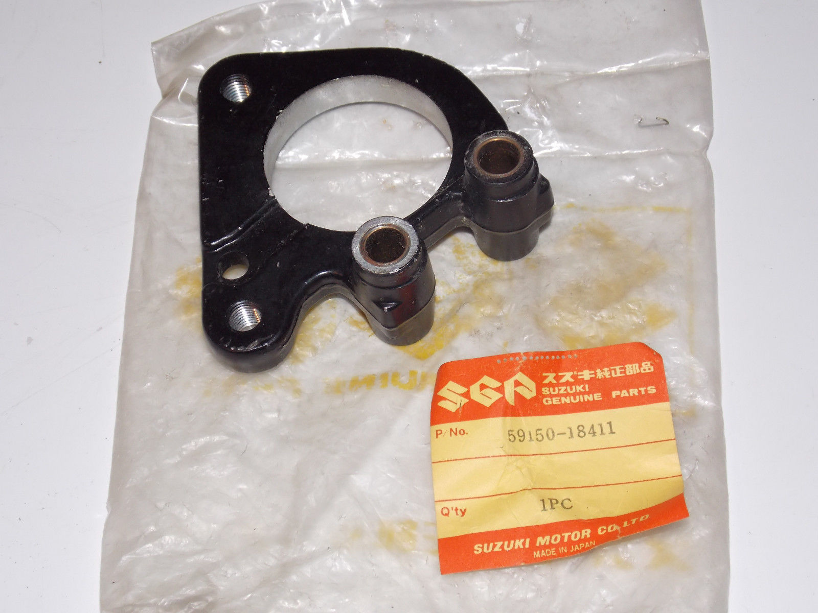 NOS SUZUKI 1973 1975 1977 GT185 GT250 GT500 GT750 RE5 CALIPER HOLDER 59150-18411 - MotoRaider
