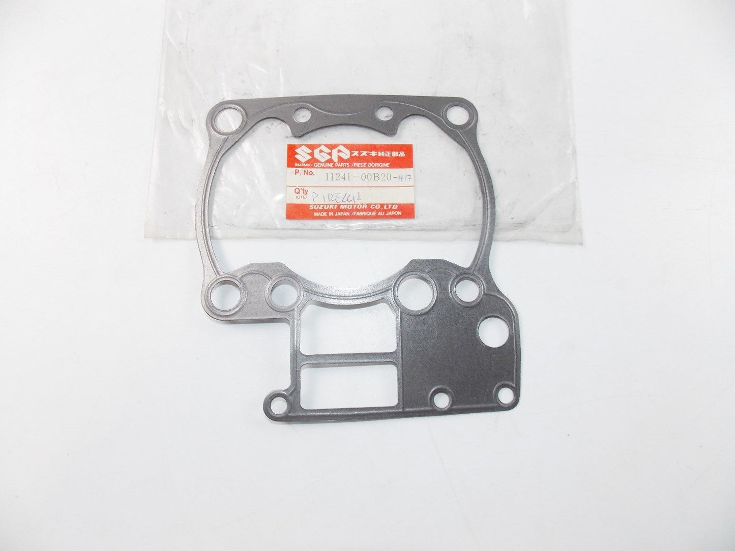NOS SUZUKI 1988 CYLINDER GASKET RM250  11241-00B20-H17 - MotoRaider