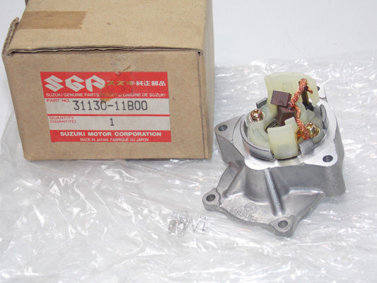 NOS NEW SUZUKI SCOOTER 1985 1991 1994 1995 CP50 BRUSH HOLDER 31130-11B00 - MotoRaider