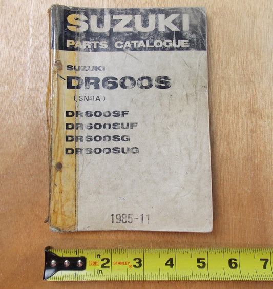 USED SUZUKI 1985-11  PARTS CATALOGUE BOOK DR600S/SF/SUF/SG/SUG  9900B-30052-010 - MotoRaider