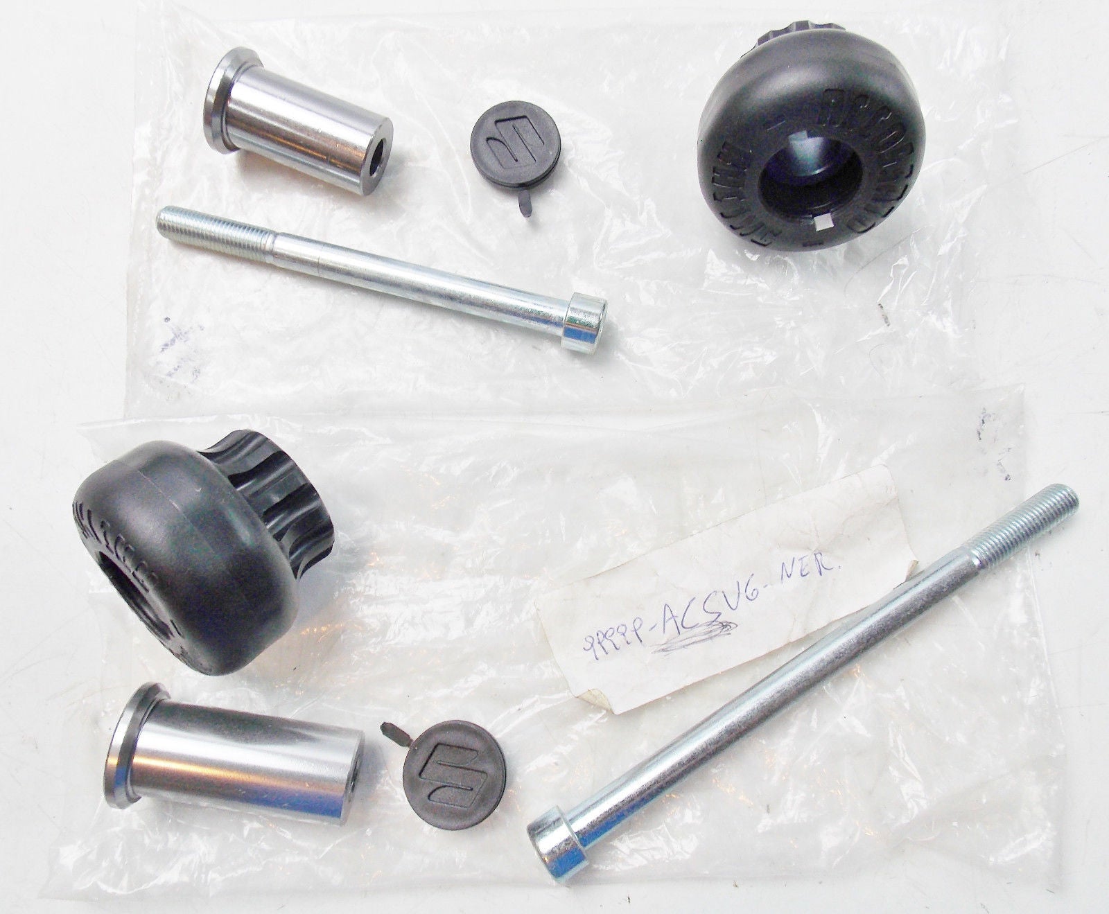 NOS NEW SUZUKI ACCOSSATO SV650 BLACK CRASH PADS FRAME SLIDERS GUARDS 99999-ACSV6 - MotoRaider