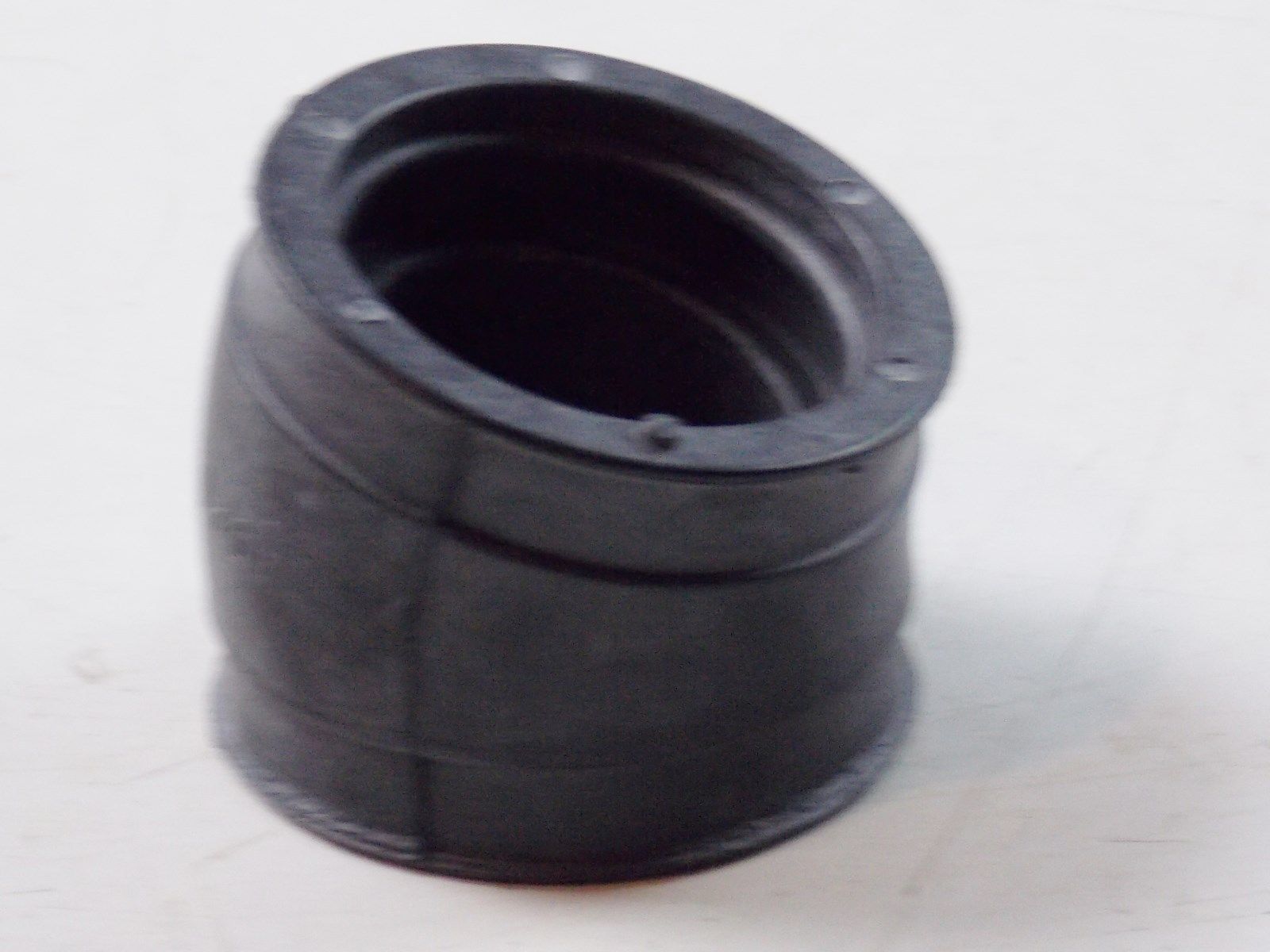 NOS SUZUKI 1980-1983 LH INTAKE PIPE CONNECTOR GS1100 13121-49200 - MotoRaider