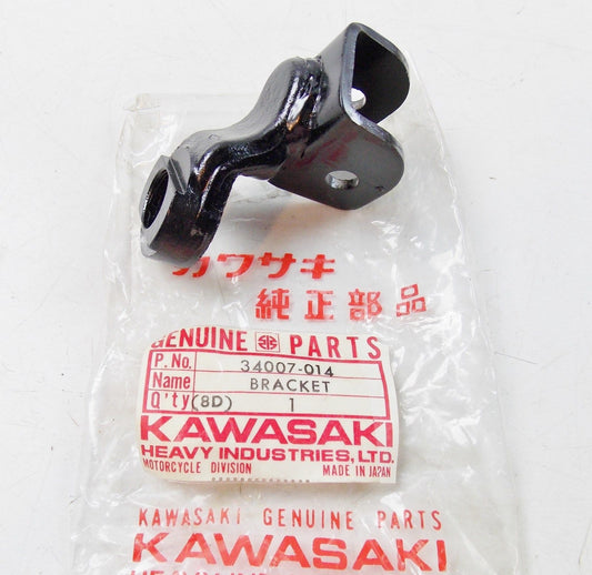 NOS KAWASAKI 1976-1979 R.H. FOOTREST BRACKET KD175 KE175   34007-014 - MotoRaider