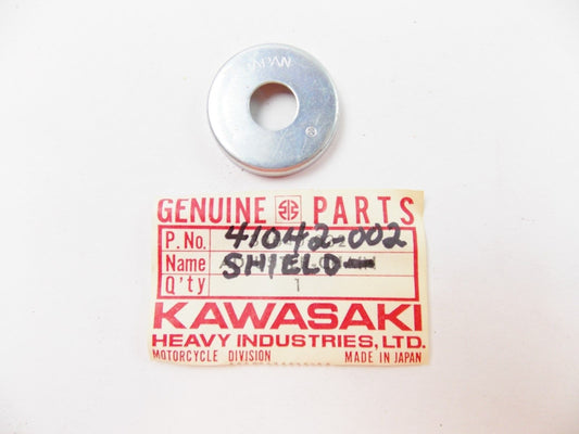 NOS KAWASAKI 1967-1981 FRONT DRUM DUST SHIELD KE100 KM100 MC1 KV100  41042-002 - MotoRaider