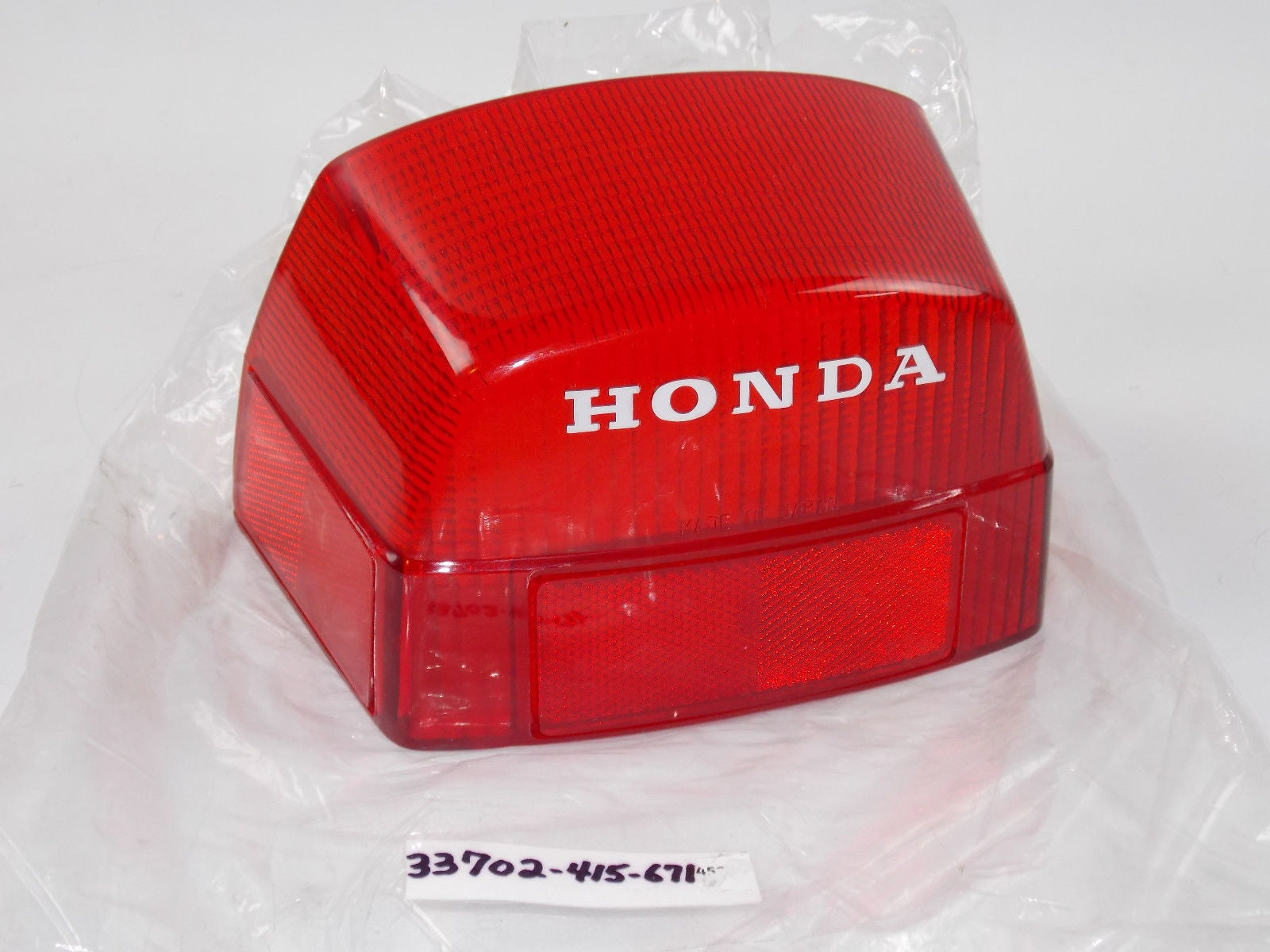 NOS HONDA 1978 1979 1980 1981 CX500 CB750 TAIL LIGHT LENS 33702-415-671 - MotoRaider