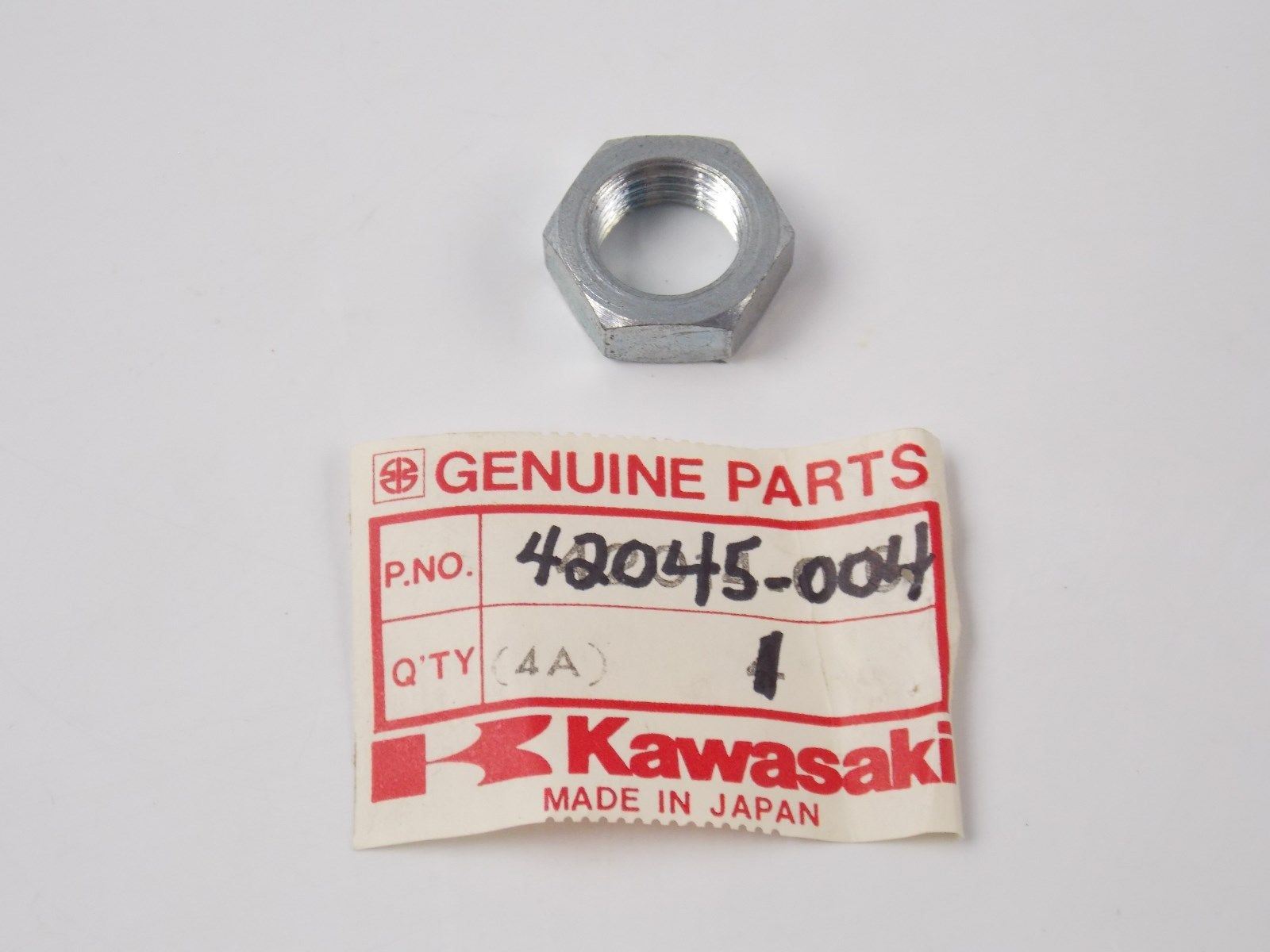 NOS OEM KAWASAKI 1970-2001 NUT G4 G5 KE100  42045-004 - MotoRaider