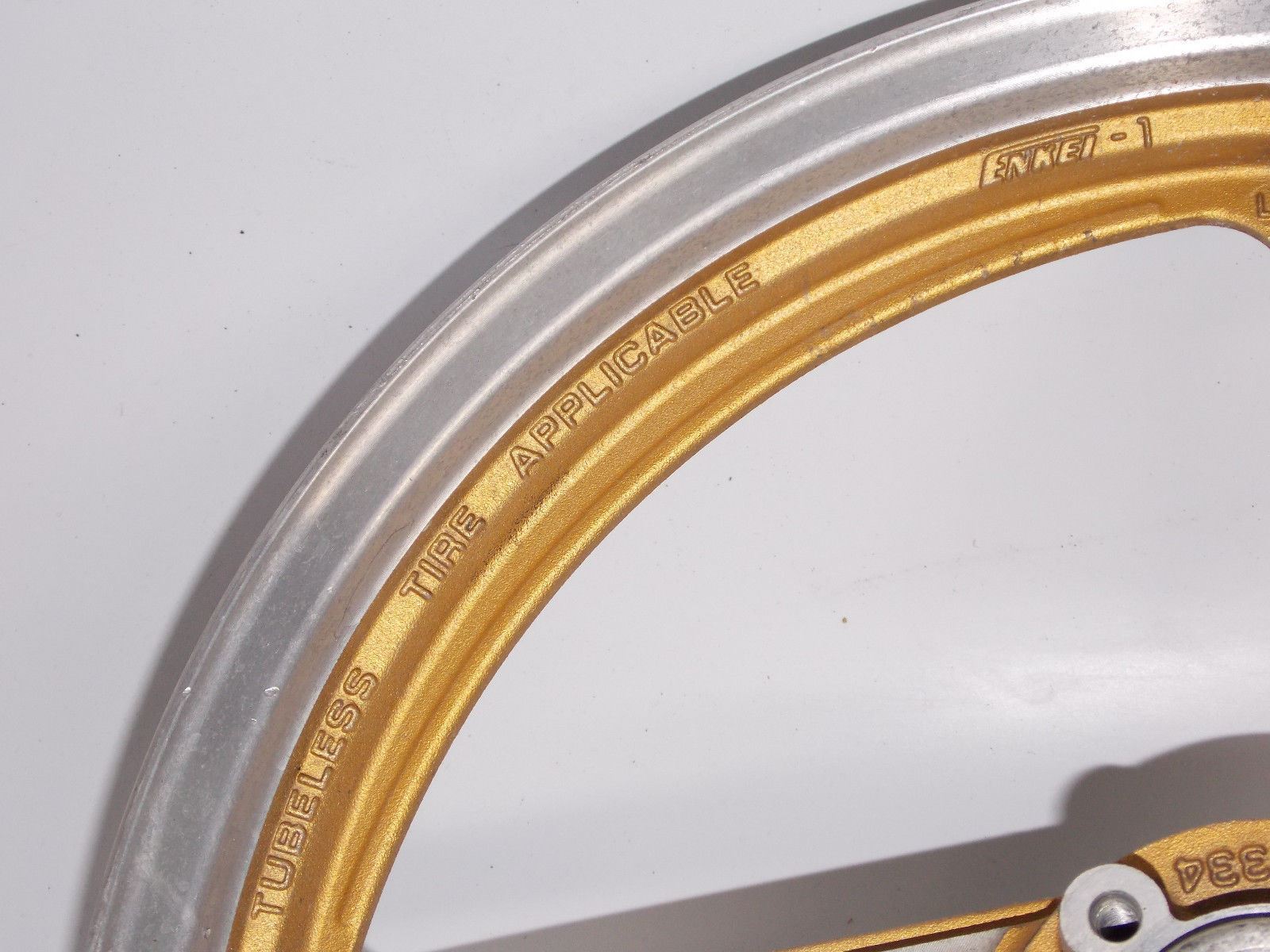 NOS 1984 NOS 16" x 2.15 ENKEI GOLD ALLOY WHEEL FRONT SUZUKI RGV250 WOLF TUBELESS - MotoRaider
