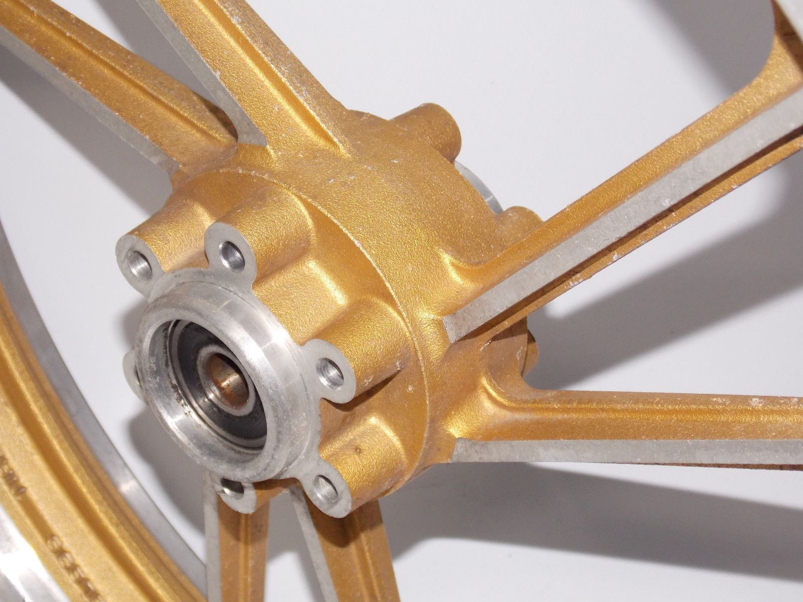 NOS 1984 NOS 16" x 2.15 ENKEI GOLD ALLOY WHEEL FRONT SUZUKI RGV250 WOLF TUBELESS - MotoRaider