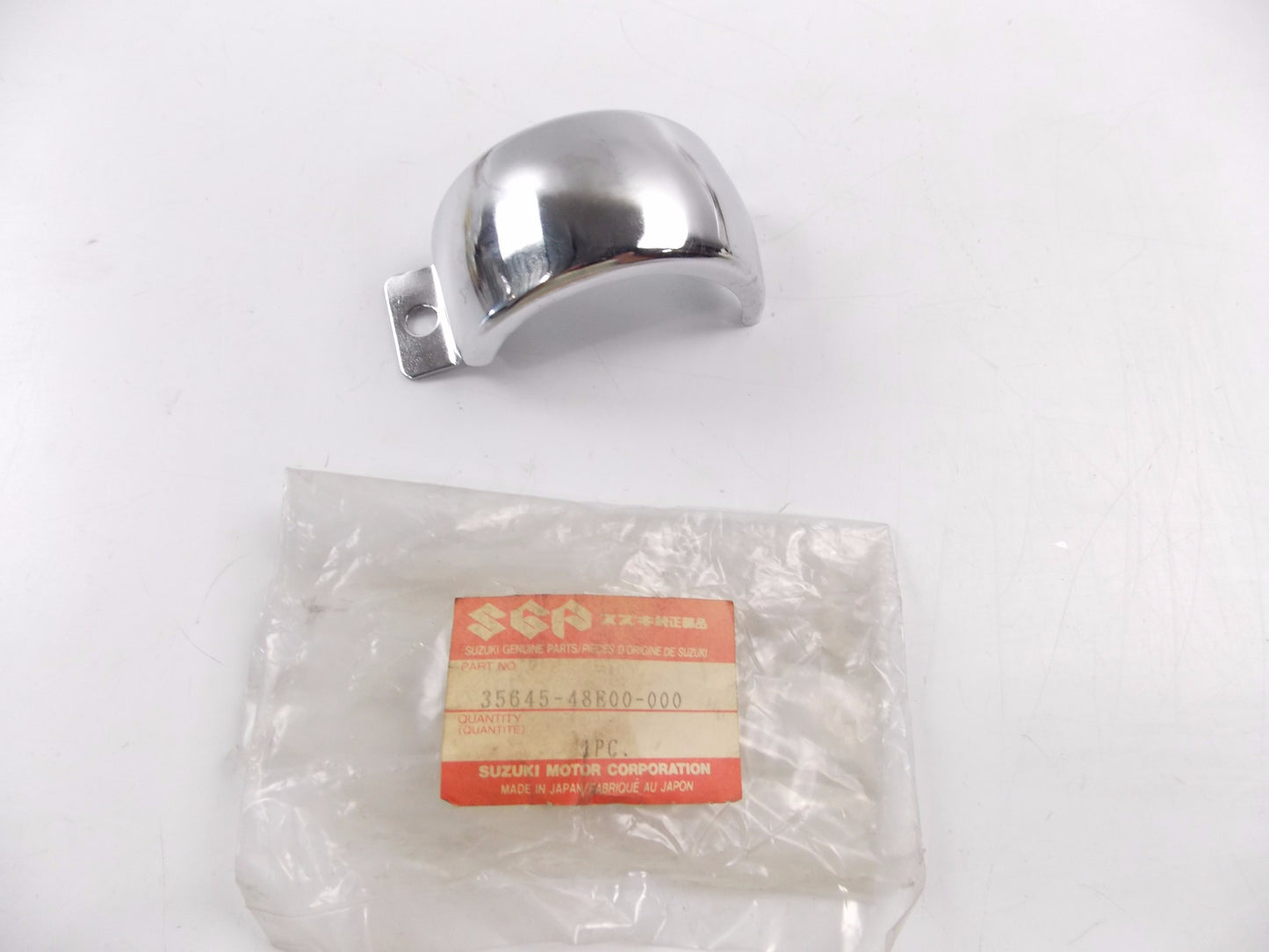 NOS OEM SUZUKI 88-89/00-04 VZ800 FRONT TURN SIGNAL STAY COVER 35645-48E00-000 - MotoRaider