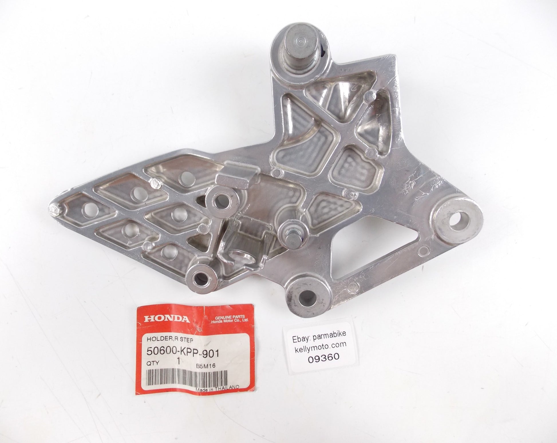 NOS OEM HONDA 2004-2010 CBR125 RIGHT FOOTREST HOLDER MOUNT PLATE 50600-KPP-901 - MotoRaider