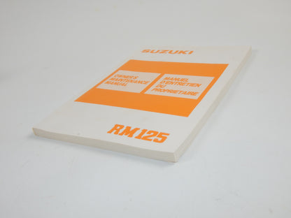 1987 SUZUKI RM125 USER OWNER MANUAL BOOK 99011-01B22-01B MULTI LANGUAGE VINTAGE - MotoRaider