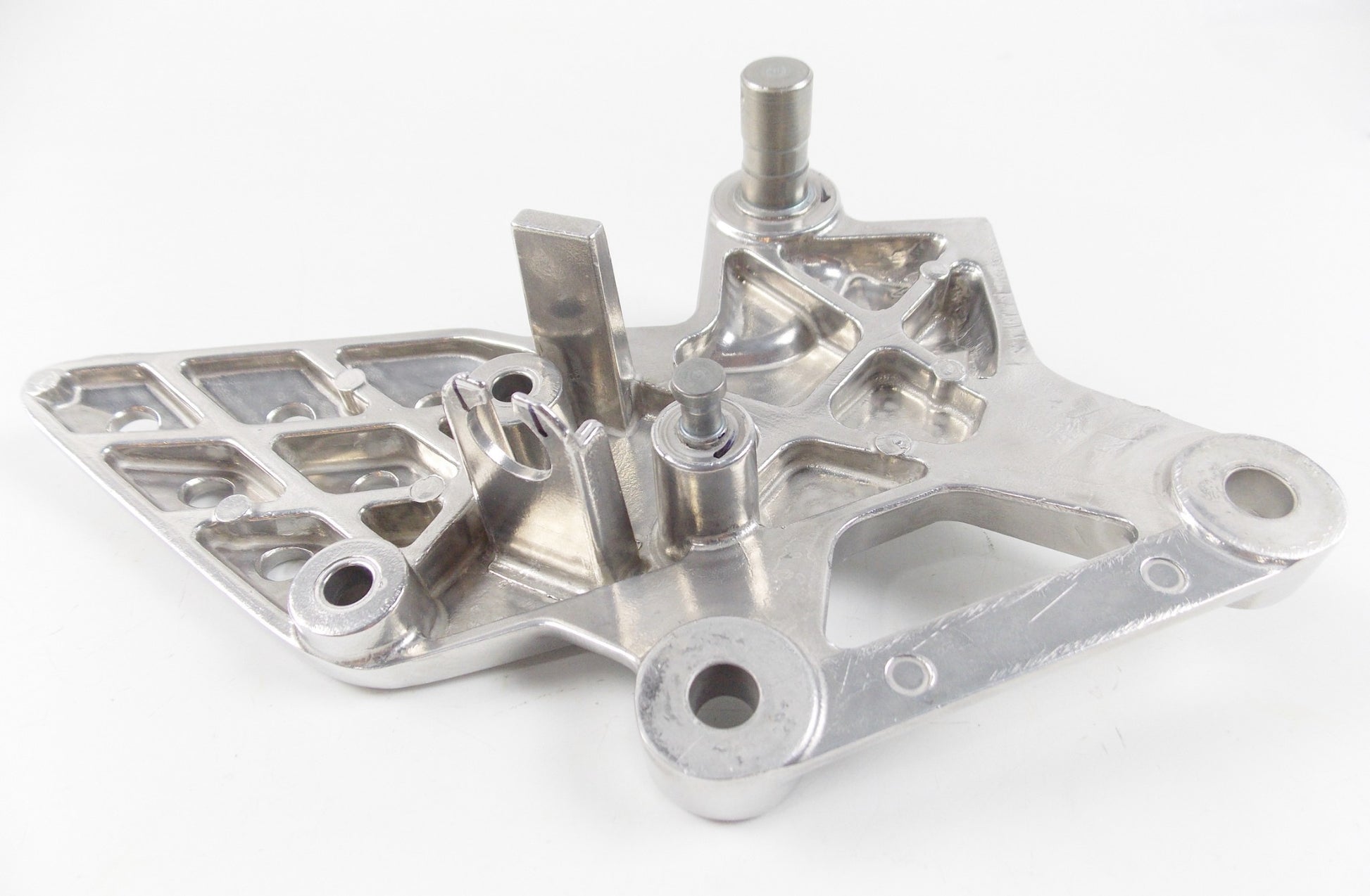 NOS OEM HONDA 2004-2010 CBR125 RIGHT FOOTREST HOLDER MOUNT PLATE 50600-KPP-901 - MotoRaider