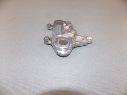 1992 KTM MXC 250 REAR WHEEL SPACER BRACKET BRAKE CALIPER HOLDER SUPPORT - MotoRaider