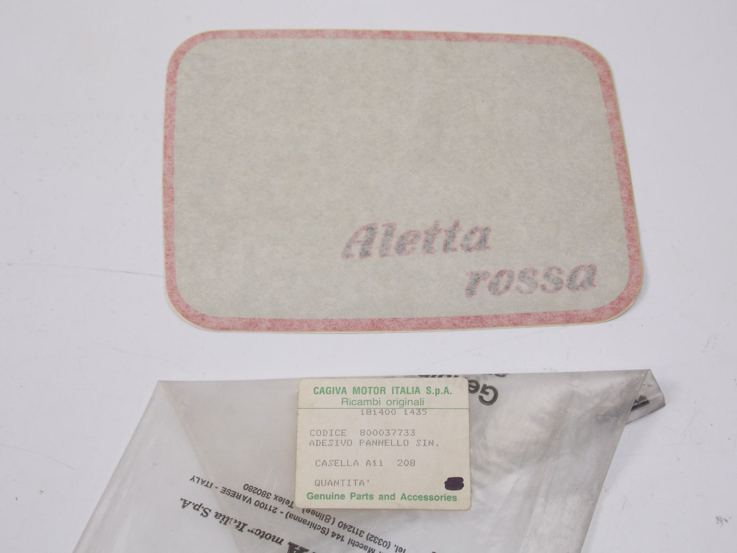 NOS OEM CAGIVA ALETTA ROSSA 125 LH BLACK PANEL STICKER "Aletta Rossa" 800037733 - MotoRaider