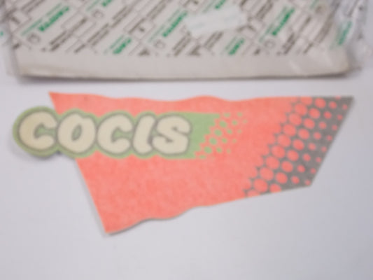 NOS OEM CAGIVA 89-90 COCIS 50-2 LEFT SIDE STCKER "COCIS" 800066375 - MotoRaider