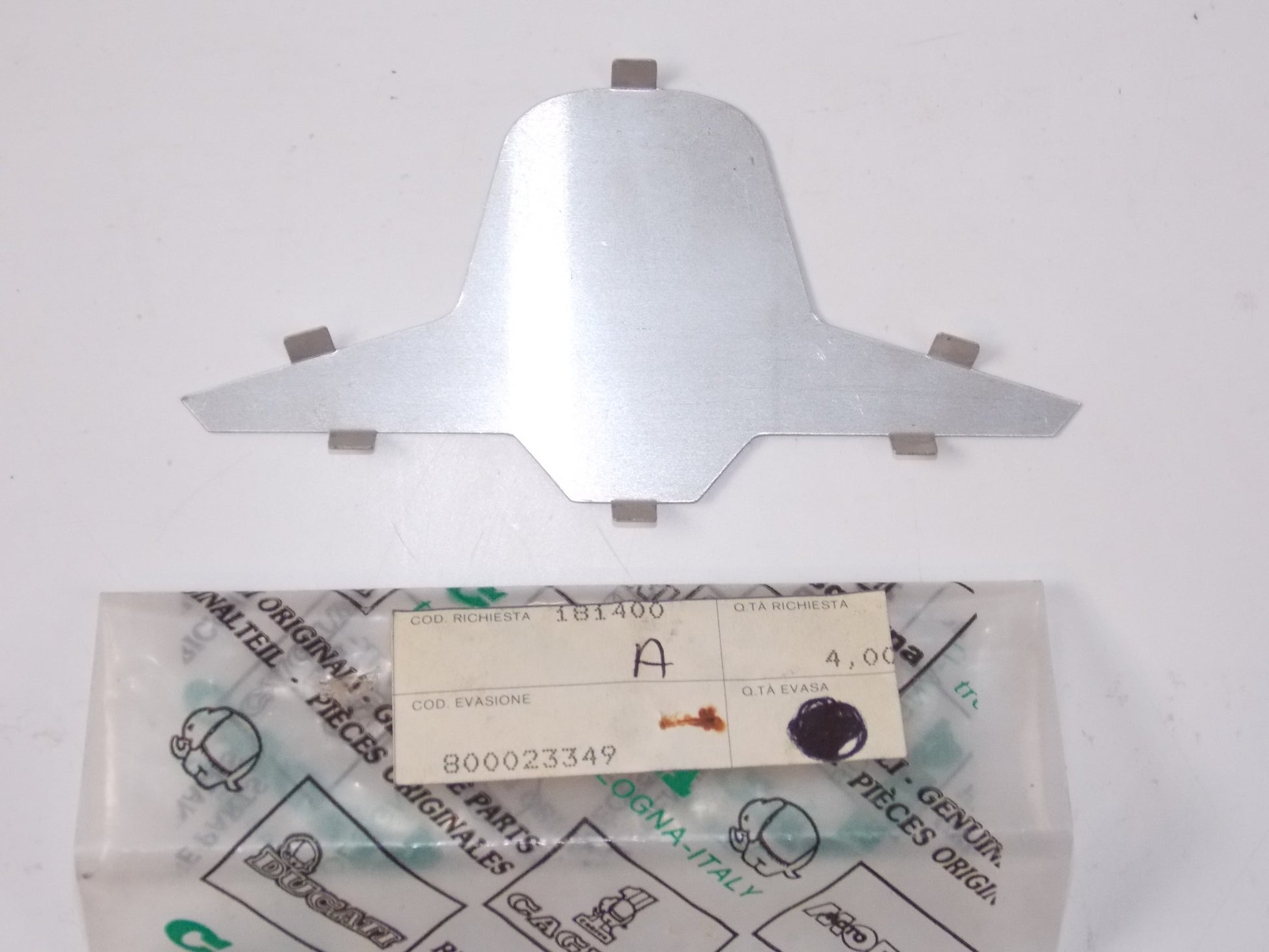 NOS OEM CAGIVA 1979 SXT 125 EXHAUST SYSTEM NAME PLATE 800023349 - MotoRaider