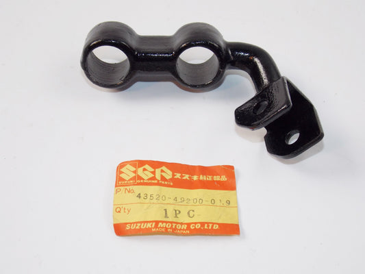 NOS OEM SUZUKI 80-81 GS1100-LT GS750L LH FRONT FOOTREST BRACKET 43520-49200-019 - MotoRaider