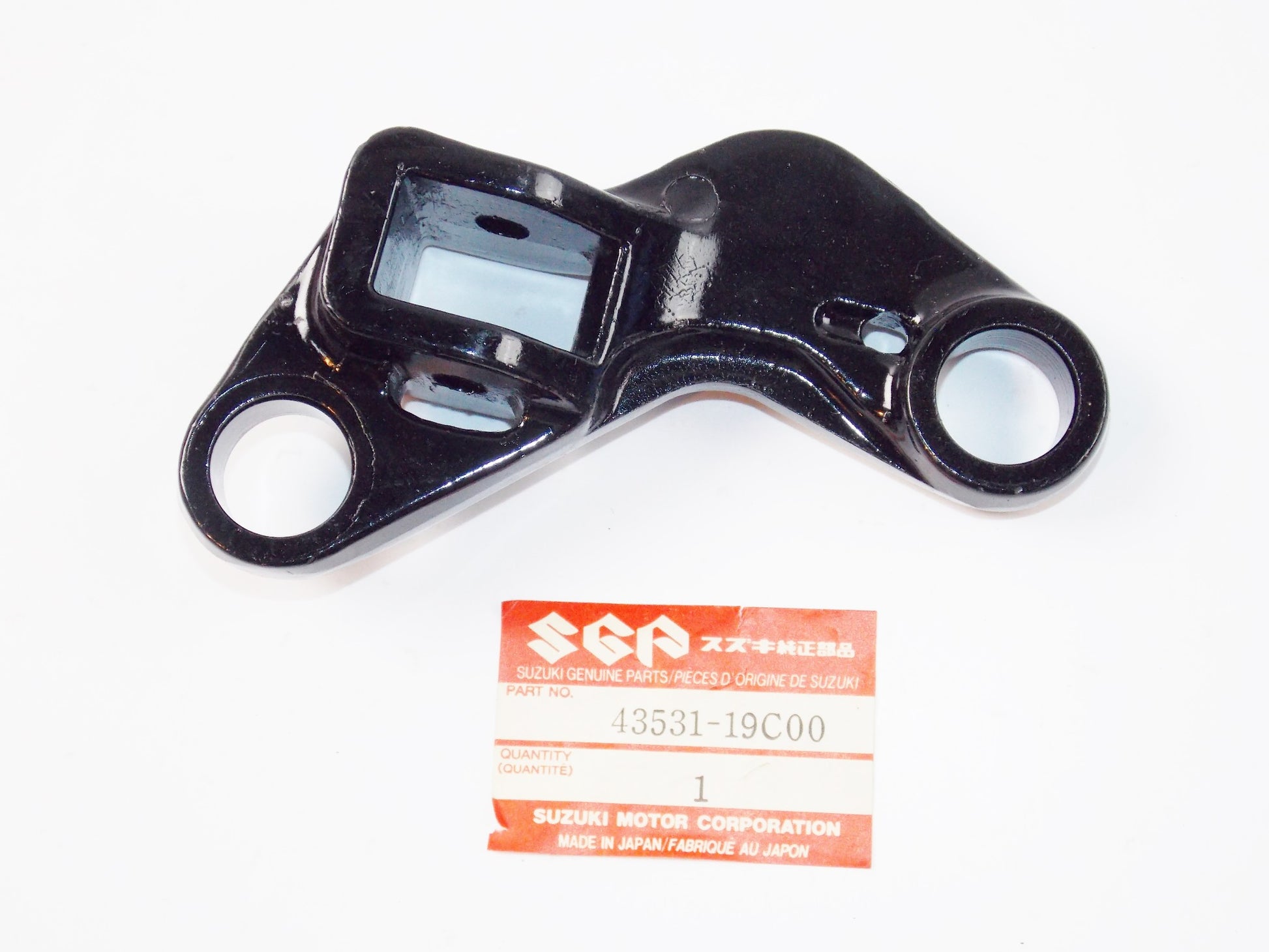 NOS OEM SUZUKI 88-06 GSX600F/FT/FV RH FRONT FOOTREST HOLDER 43531-19C00 - MotoRaider