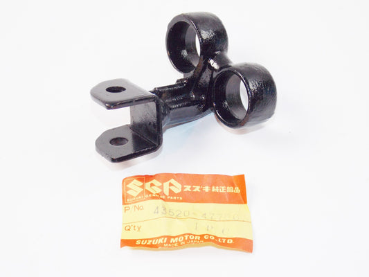 NOS OEM SUZUKI 81-82 GS550 KATANA LH FRONT FOOTREST BRACKET 43520-47700 - MotoRaider