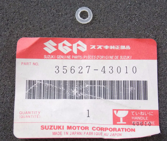 NOS OEM SUZUKI 73-15 ALT GS SP LT GT TS LS VS TC LENS SCREW GASKET 35627-43010 - MotoRaider