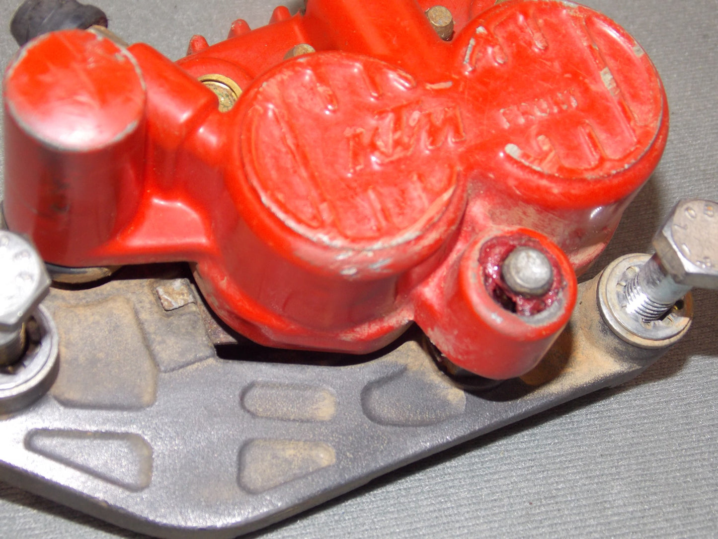 OEM 1992 KTM MXC 250 FRONT WHEEL BRAKE CALIPER PENTON - MotoRaider