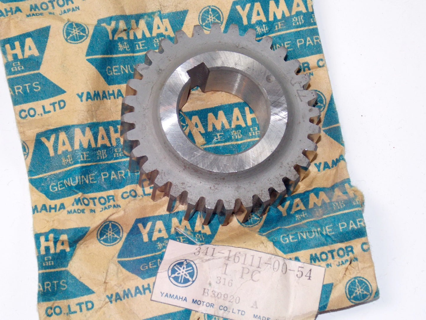 NOS OEM YAMAHA 73-74 TX750/A CRANK PISTON GEAR PRIMARY DRIVE # 341-16111-00-54 - MotoRaider