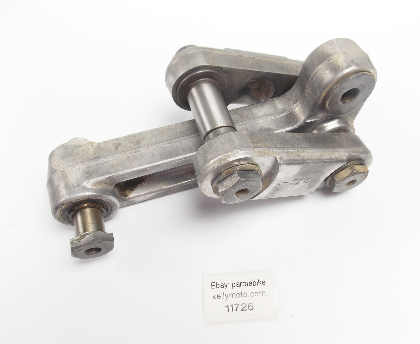 1990 YAMAHA YZ125 SWINGARM RELAY ARM SHOCK MOUNT CONNECTOR 3JD-2217F 3JD-2217A - MotoRaider