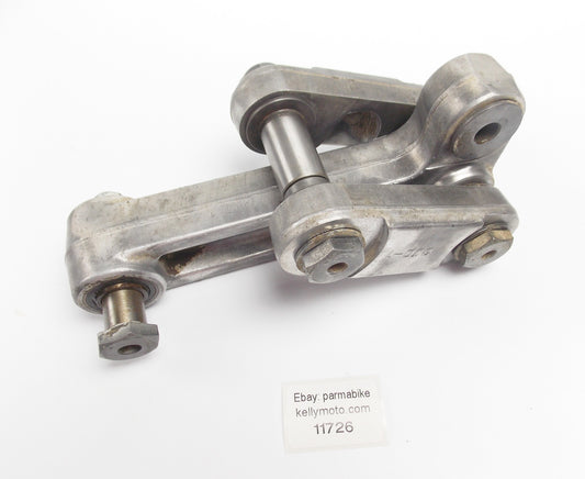 1990 YAMAHA YZ125 SWINGARM RELAY ARM SHOCK MOUNT CONNECTOR 3JD-2217F 3JD-2217A - MotoRaider