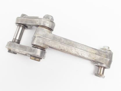 1990 YAMAHA YZ125 SWINGARM RELAY ARM SHOCK MOUNT CONNECTOR 3JD-2217F 3JD-2217A - MotoRaider