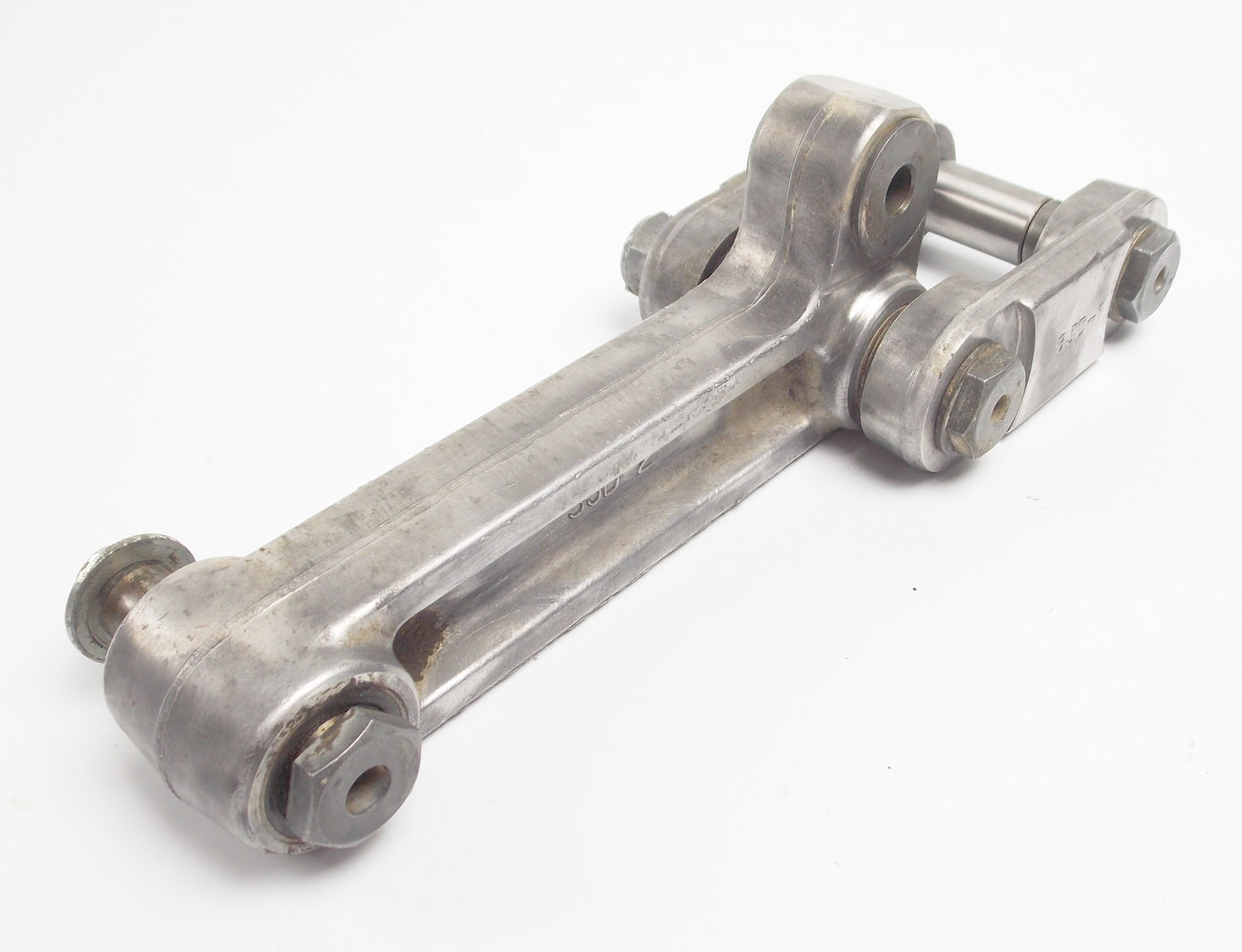 1990 YAMAHA YZ125 SWINGARM RELAY ARM SHOCK MOUNT CONNECTOR 3JD-2217F 3JD-2217A - MotoRaider