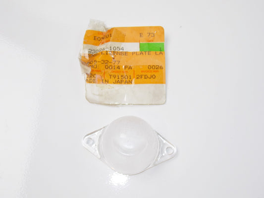NOS OEM KAWASAKI 84-15 KL600 ZX900 ZG1000 Vulcan LENS LICNSE PLATE LA 23026-1054 - MotoRaider