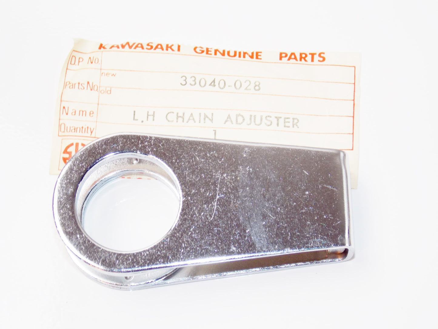 NOS OEM KAWASAKI 69-76 H1 KH500 ADJUSTER CHAIN L.H 33040-028 - MotoRaider