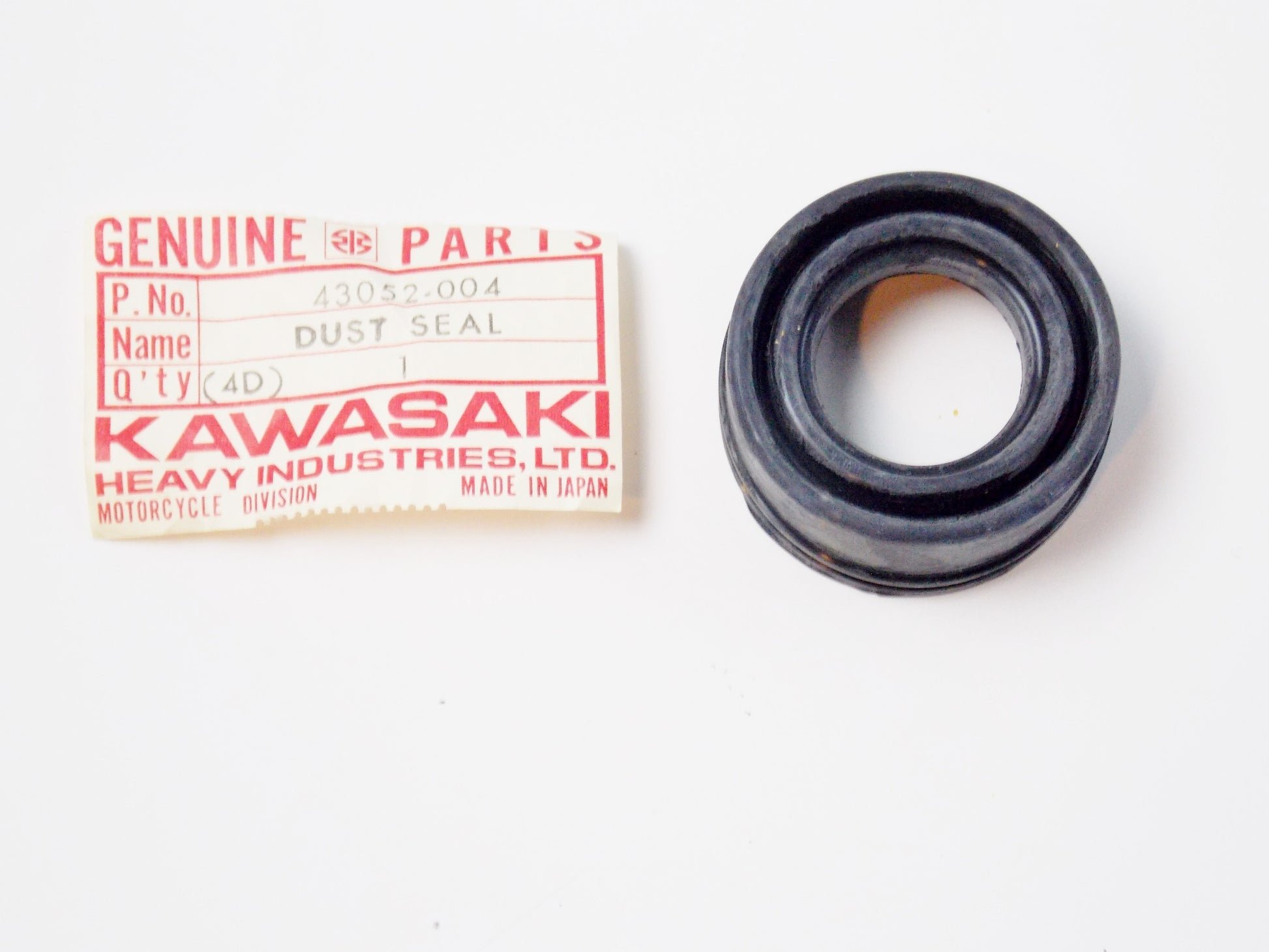 NOS OEM KAWASAKI 74-78 KZ400 FRONT BRAKE DUST SEAL 43052-004 - MotoRaider