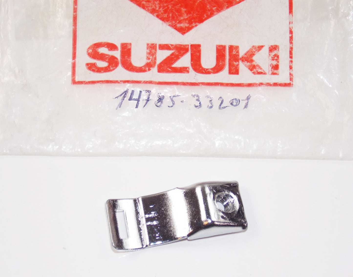 NOS OEM SUZUKI CLAMP MUFFLER COVER 14785-33201 - MotoRaider