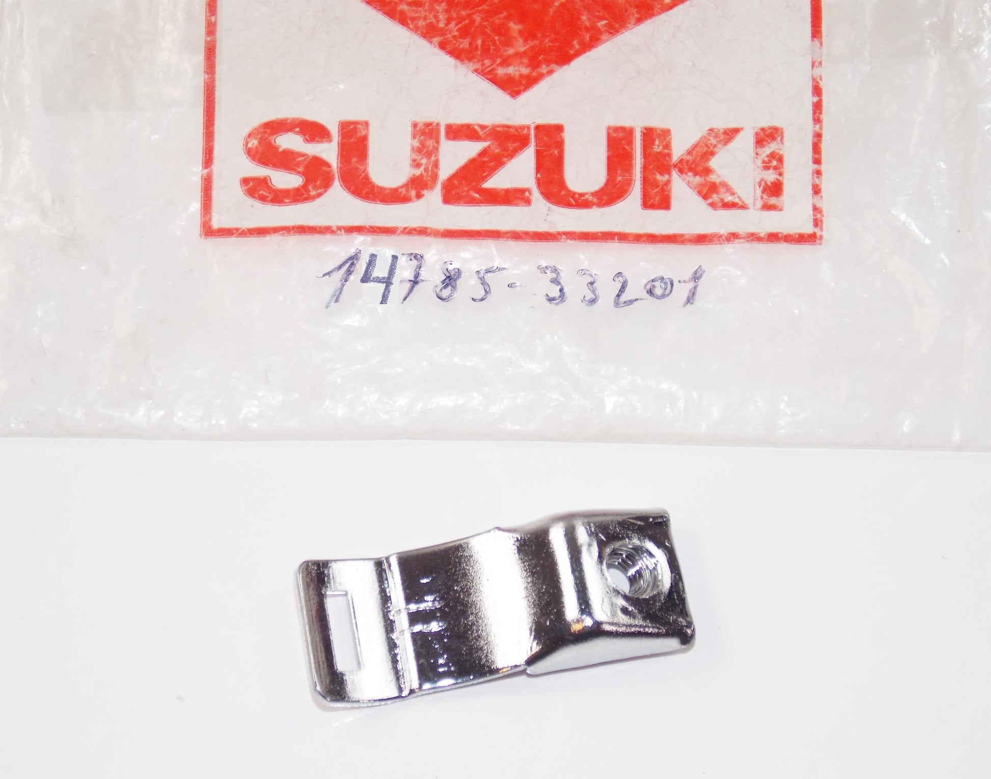 NOS OEM SUZUKI CLAMP MUFFLER COVER 14785-33201 - MotoRaider