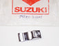 NOS OEM SUZUKI CLAMP MUFFLER COVER 14785-33201 - MotoRaider